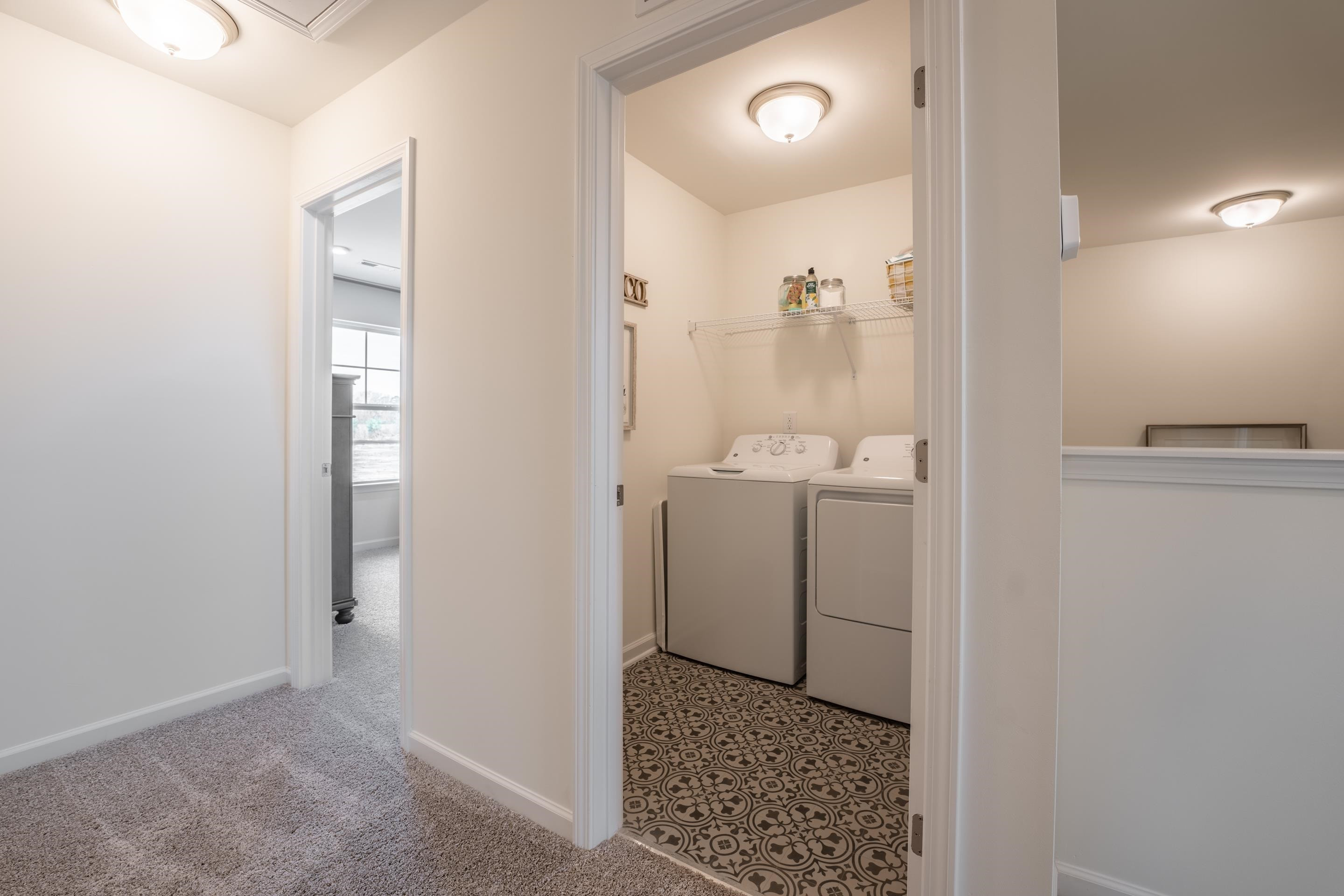 6517 Winter Spring Drive Wake Forest, NC 27587 - Photo 35 of 40 a bathroom with a sink and mirror