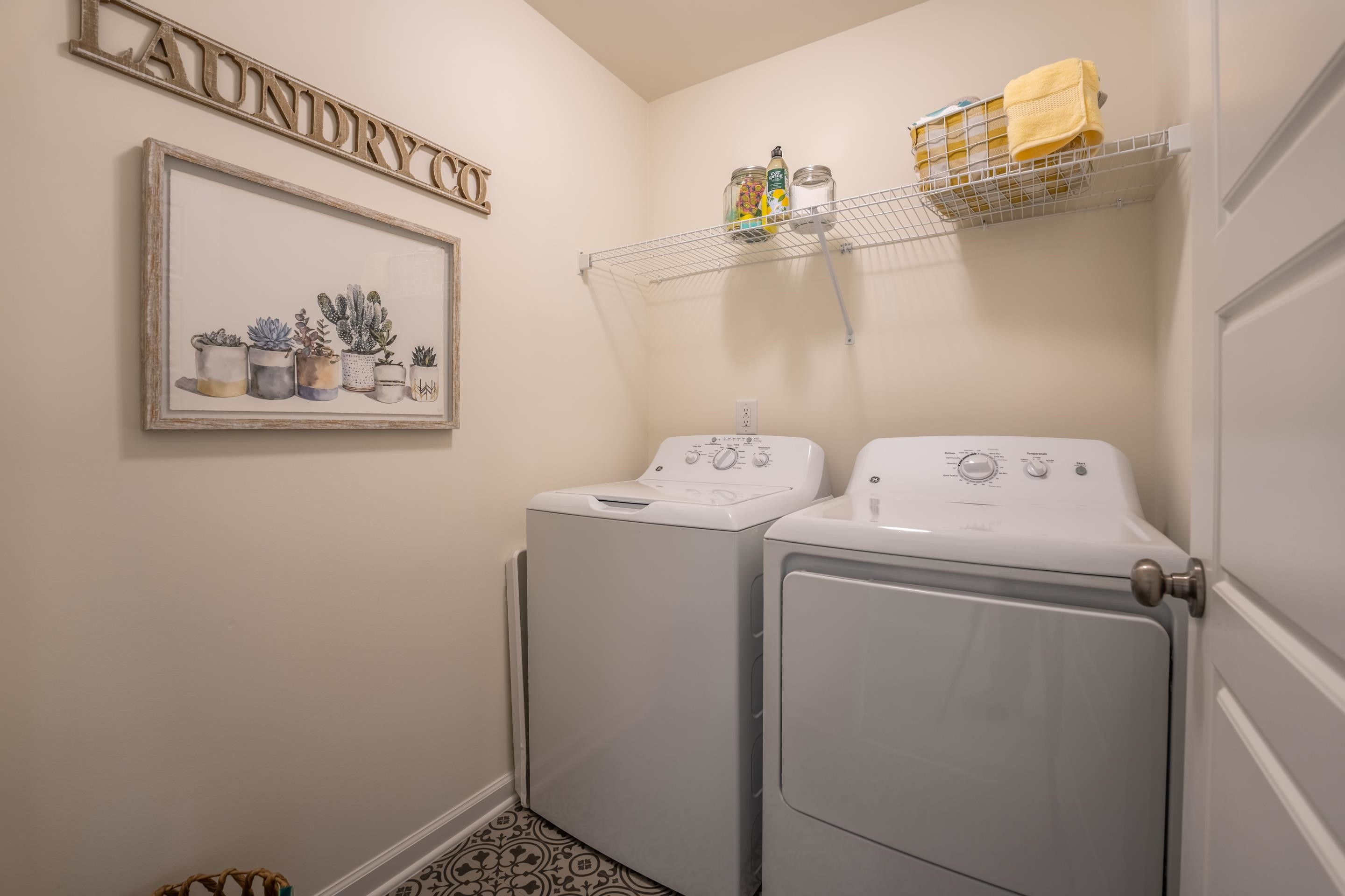 6517 Winter Spring Drive Wake Forest, NC 27587 - Photo 36 of 40 a utility room with dryer and washer