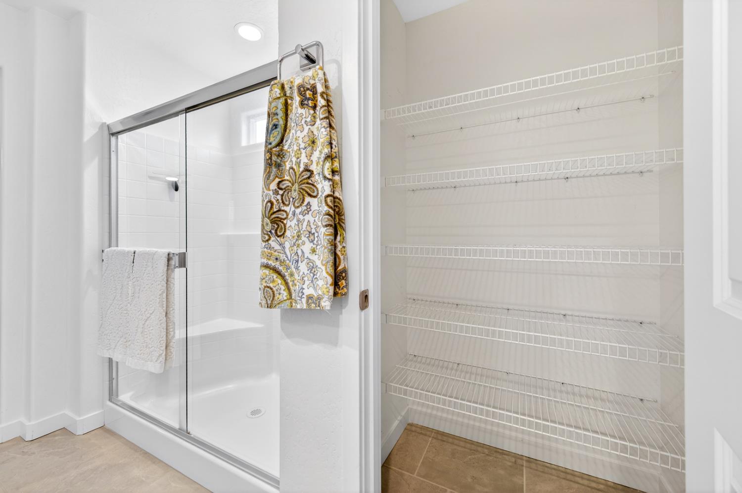 317 Talus Way South Madera, CA 93636 - Photo 34 of 61 a bathroom with a shower