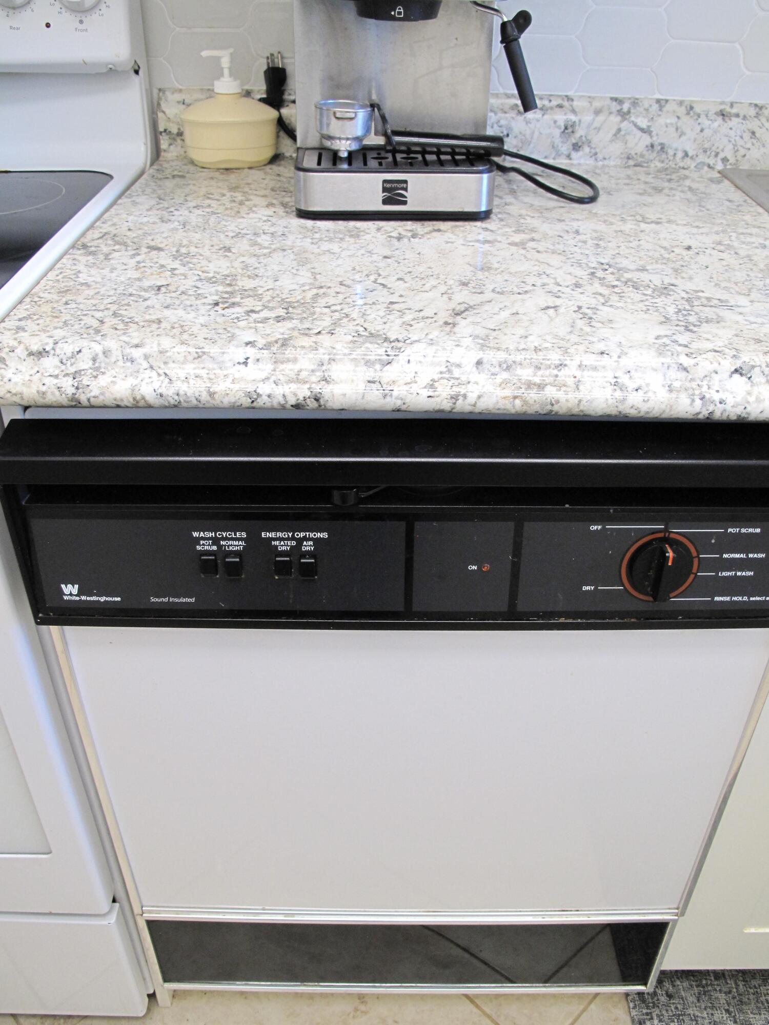 892 North High Point Boulevard North, Unit D Delray Beach, FL 33445 - Photo 11 of 44 a close view of sink and tap