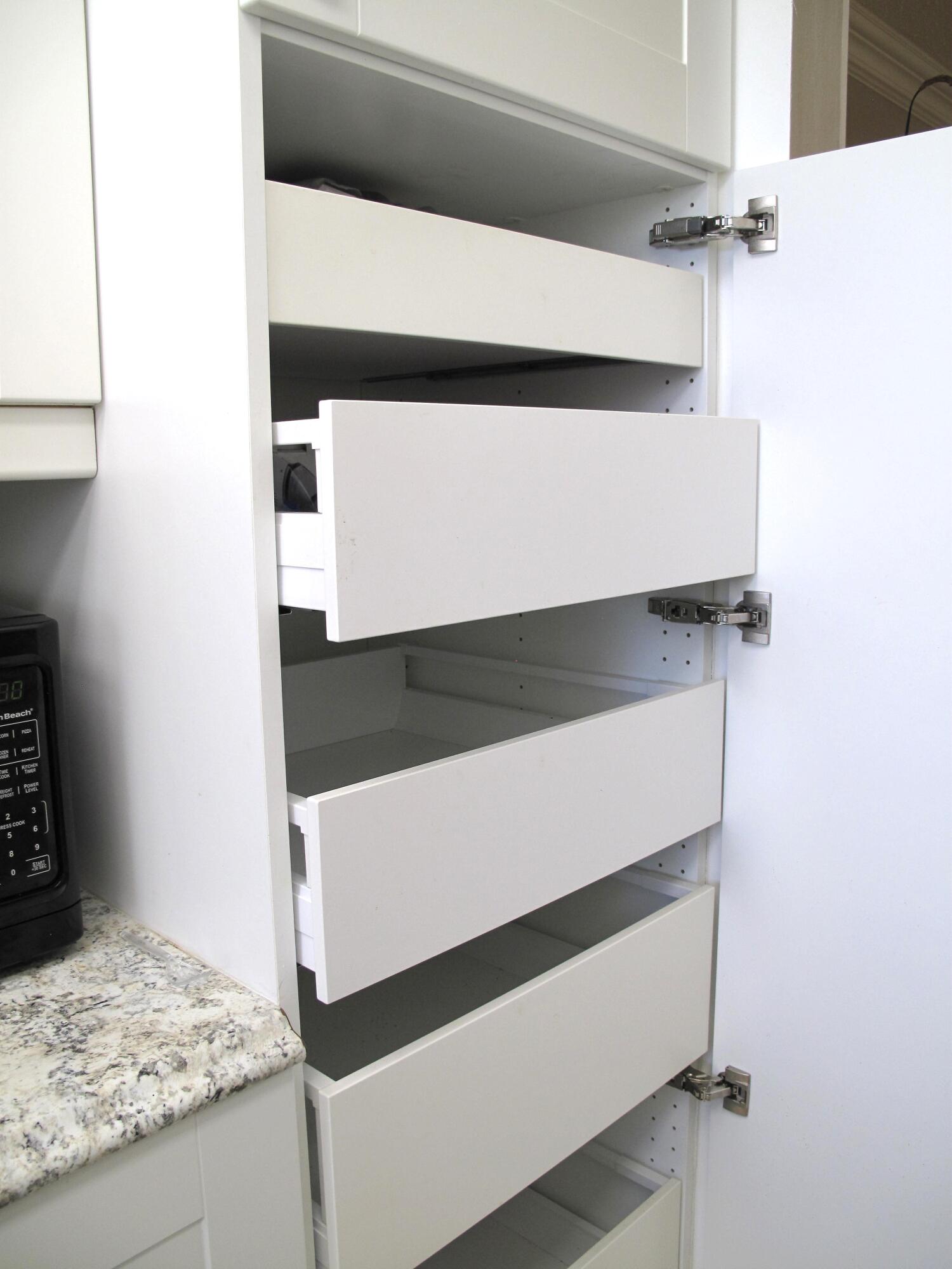 892 North High Point Boulevard North, Unit D Delray Beach, FL 33445 - Photo 12 of 44 a utility room with washer and dryer