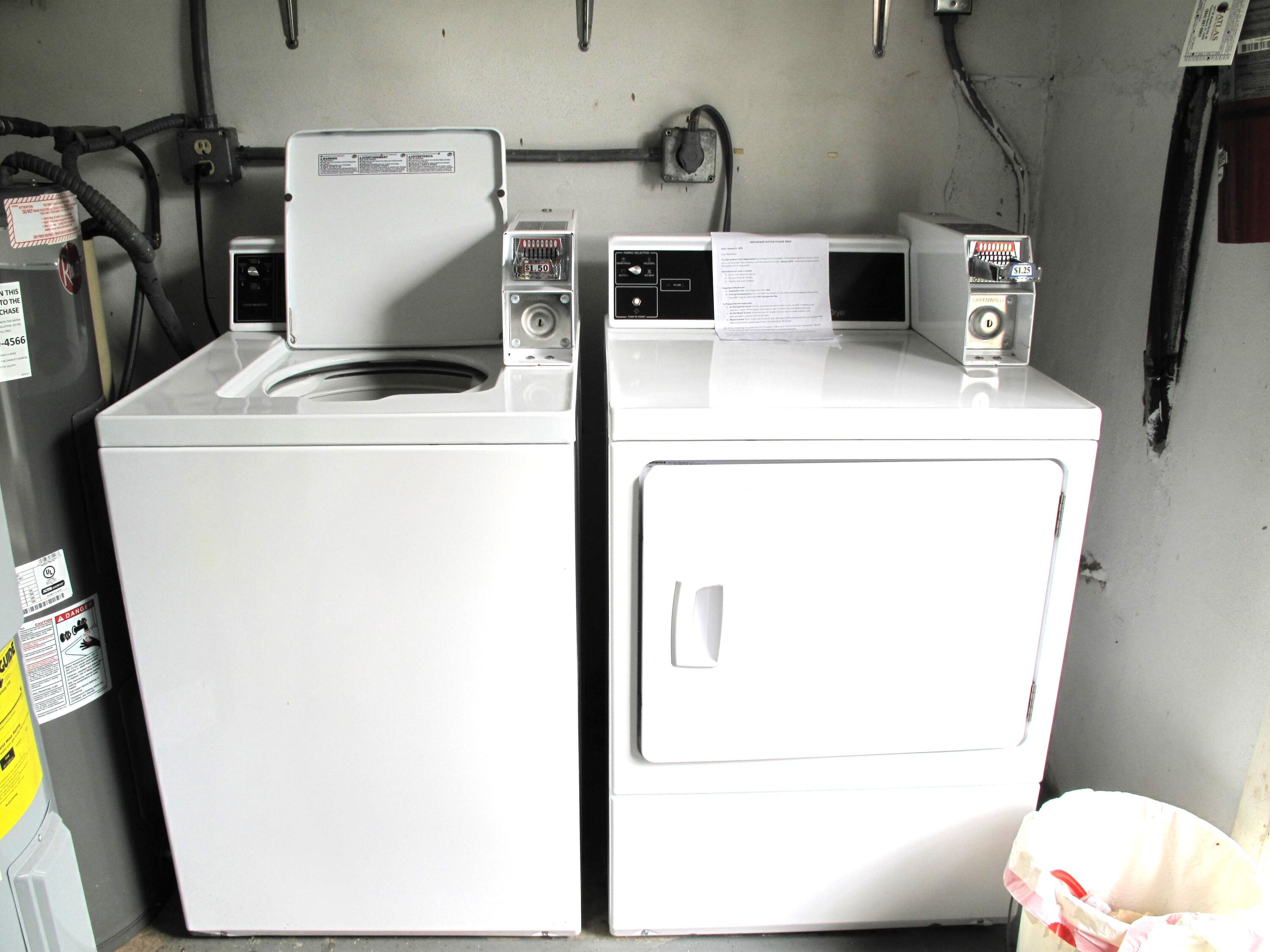892 North High Point Boulevard North, Unit D Delray Beach, FL 33445 - Photo 35 of 44 a utility room with dryer and washer