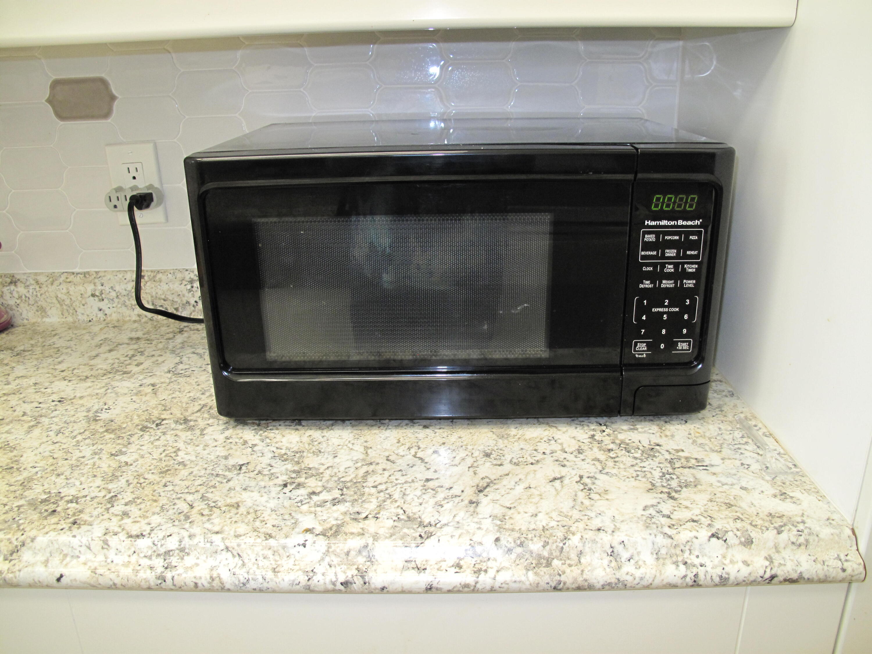892 North High Point Boulevard North, Unit D Delray Beach, FL 33445 - Photo 10 of 44 a closeup of a sink
