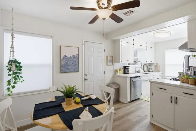 a kitchen with a sink stove and refrigerator
