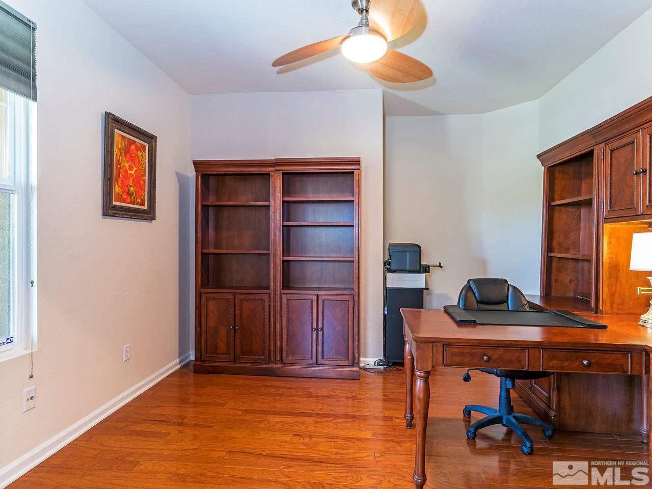 9149 Quilberry Way Reno, NV 89523 - Photo 17 of 20 a view of a workspace with furniture and a window