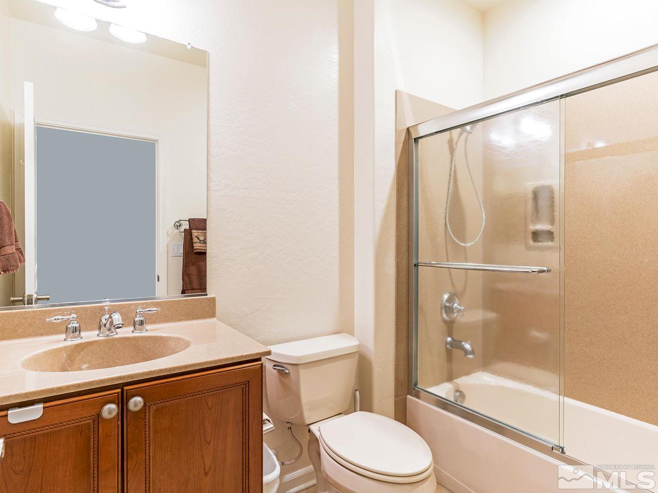 9149 Quilberry Way Reno, NV 89523 - Photo 20 of 20 a bathroom with a sink a toilet and shower