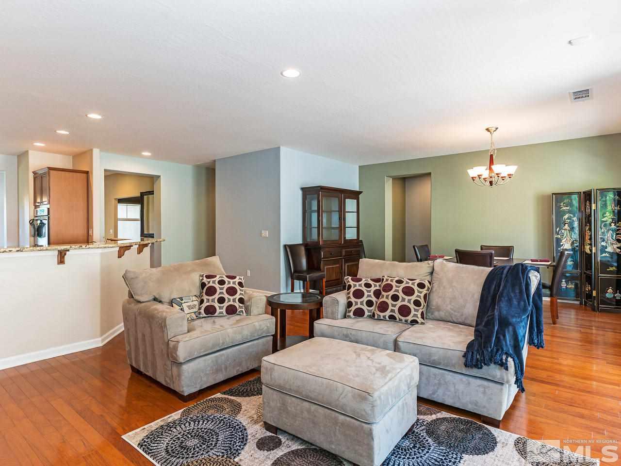 9149 Quilberry Way Reno, NV 89523 - Photo 5 of 20 a living room with furniture and wooden floor