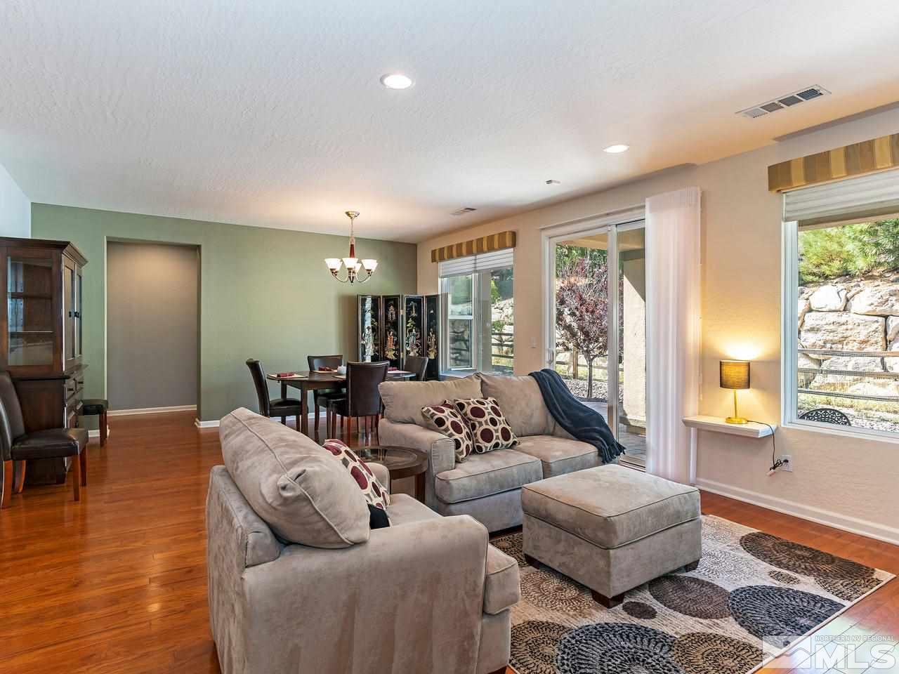 9149 Quilberry Way Reno, NV 89523 - Photo 6 of 20 a living room with furniture and a large window