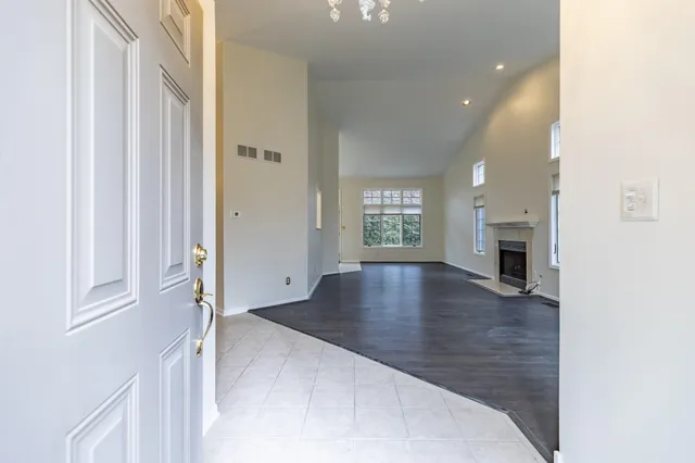 a view of livingroom and hardwood floor
