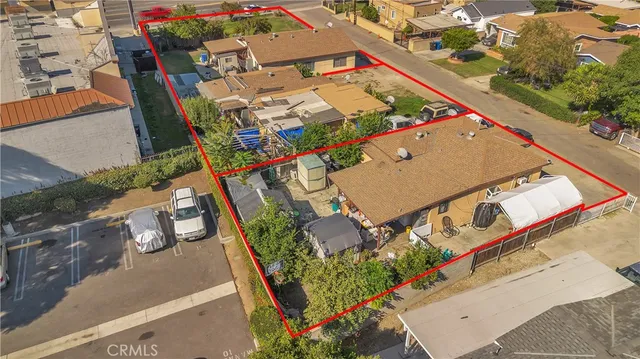 an aerial view of a city with lots of residential buildings