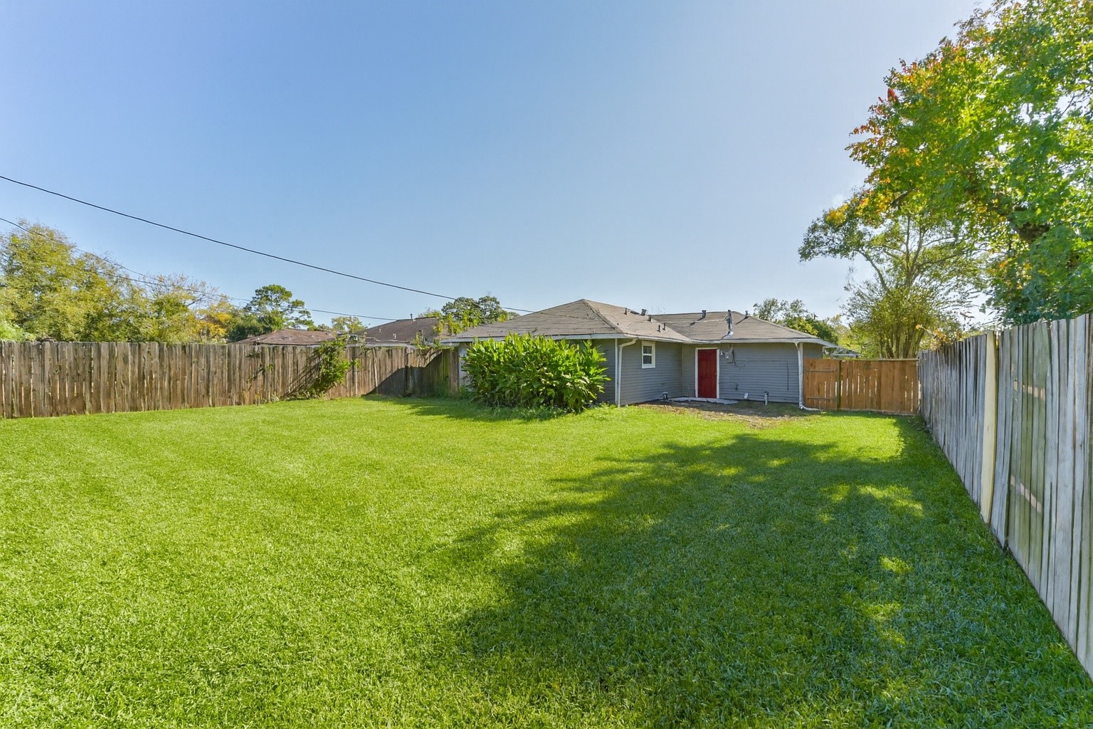 5130 Ripplebrook Drive Houston, TX 77045 - Photo 19 of 19 Another view of the large backyard. Note: the grass was virtually edited. Tons of space for kids and pets to play and for outdoor enjoyment! This home is situated in an ideal location w/ easy access to the Medical Center, The Galleria, & major freeways including 610, Beltway 8, 288, Highway 90, Sam Houston Toll Road - commuting is a breeze! Don’t miss this incredible opportunity to live in a home that truly feels brand new!