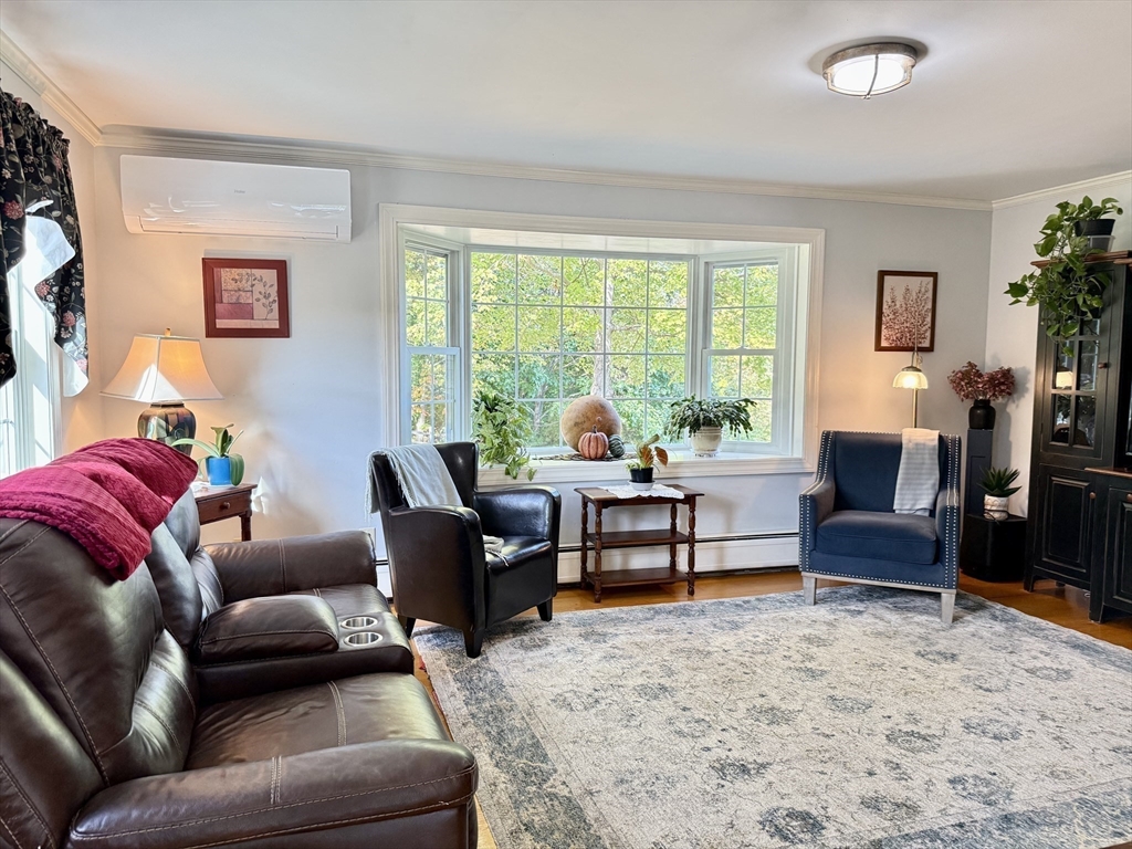 41 Hog Hollow Road Buckland, MA 01370 - Photo 12 of 42 a living room with furniture and a large window