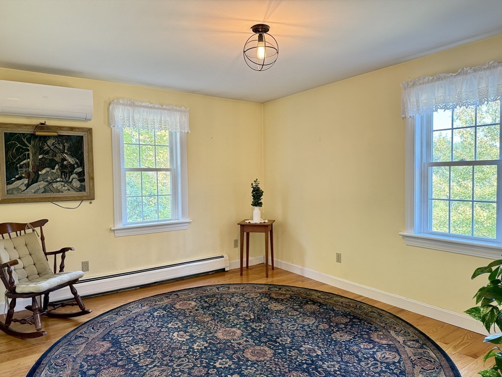 41 Hog Hollow Road Buckland, MA 01370 - Photo 14 of 42 a view of a livingroom with wooden floor and a window
