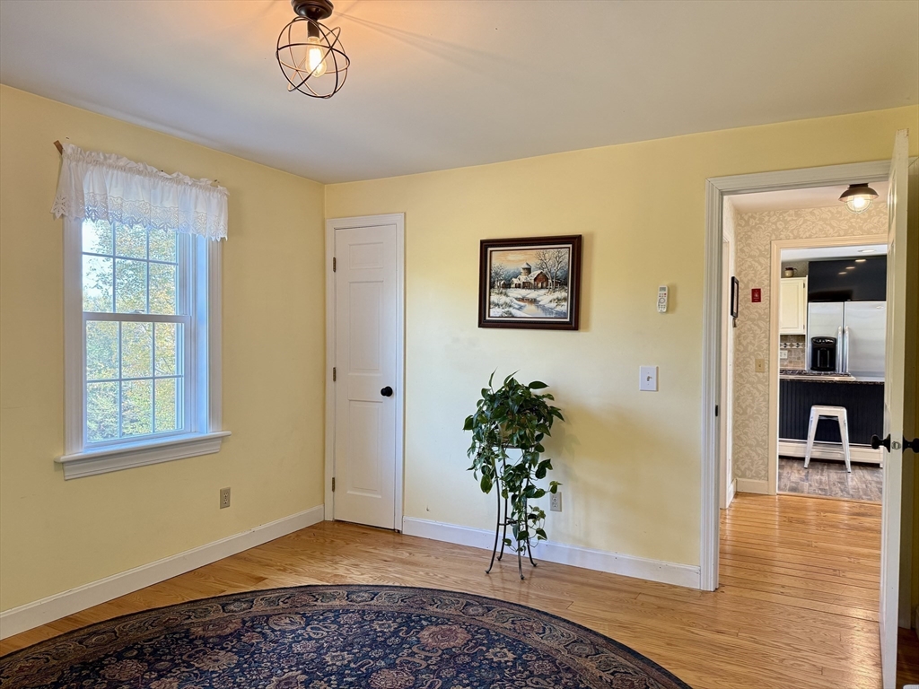 41 Hog Hollow Road Buckland, MA 01370 - Photo 15 of 42 a view of livingroom with hardwood floor and a potted plant