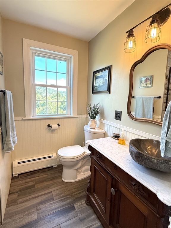 41 Hog Hollow Road Buckland, MA 01370 - Photo 16 of 42 a bathroom with a granite countertop toilet sink and mirror