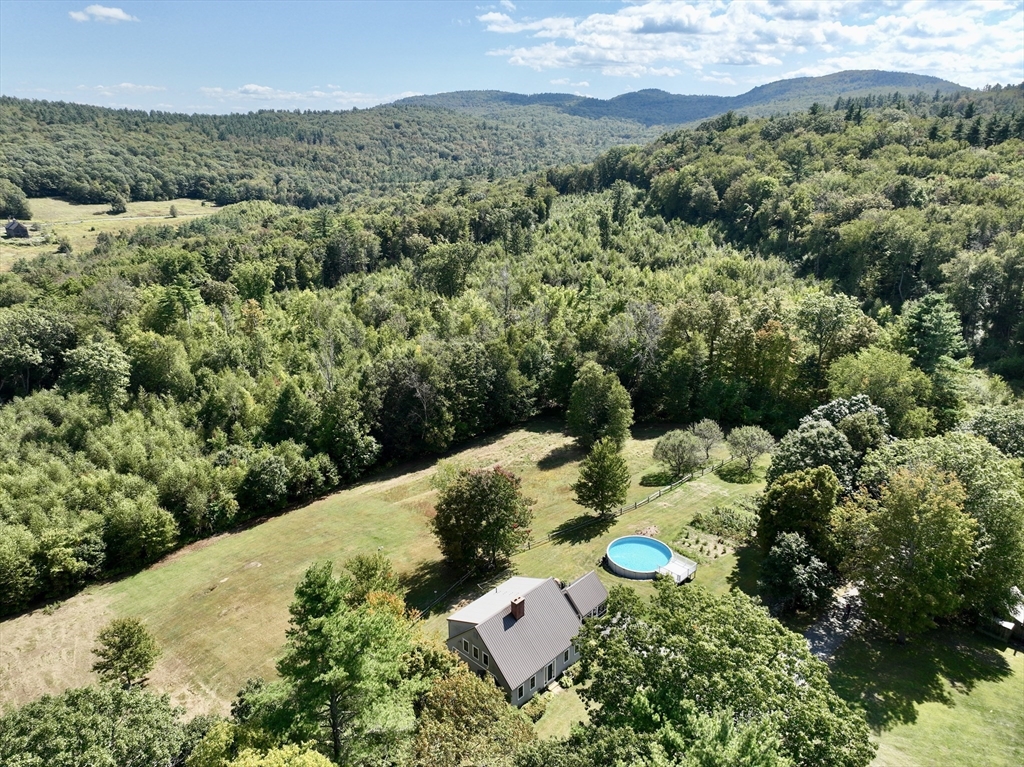 41 Hog Hollow Road Buckland, MA 01370 - Photo 2 of 42 an aerial view of a house with a yard