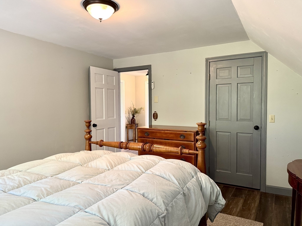 41 Hog Hollow Road Buckland, MA 01370 - Photo 26 of 42 a bedroom with a bed and wooden floor