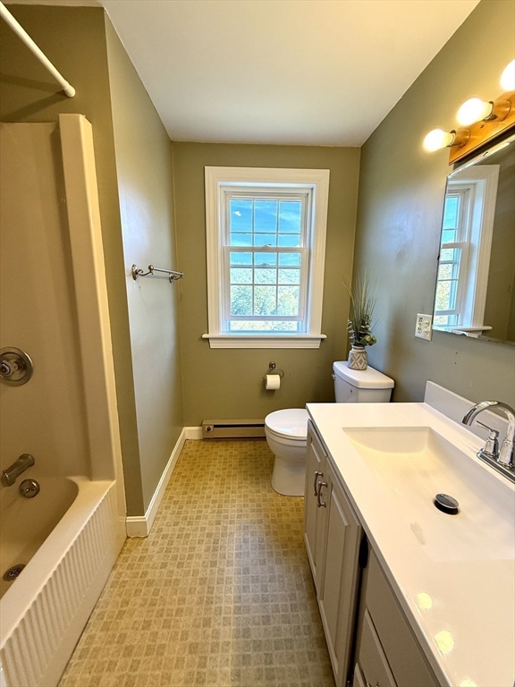 41 Hog Hollow Road Buckland, MA 01370 - Photo 29 of 42 a bathroom with a tub sink toilet and a mirror