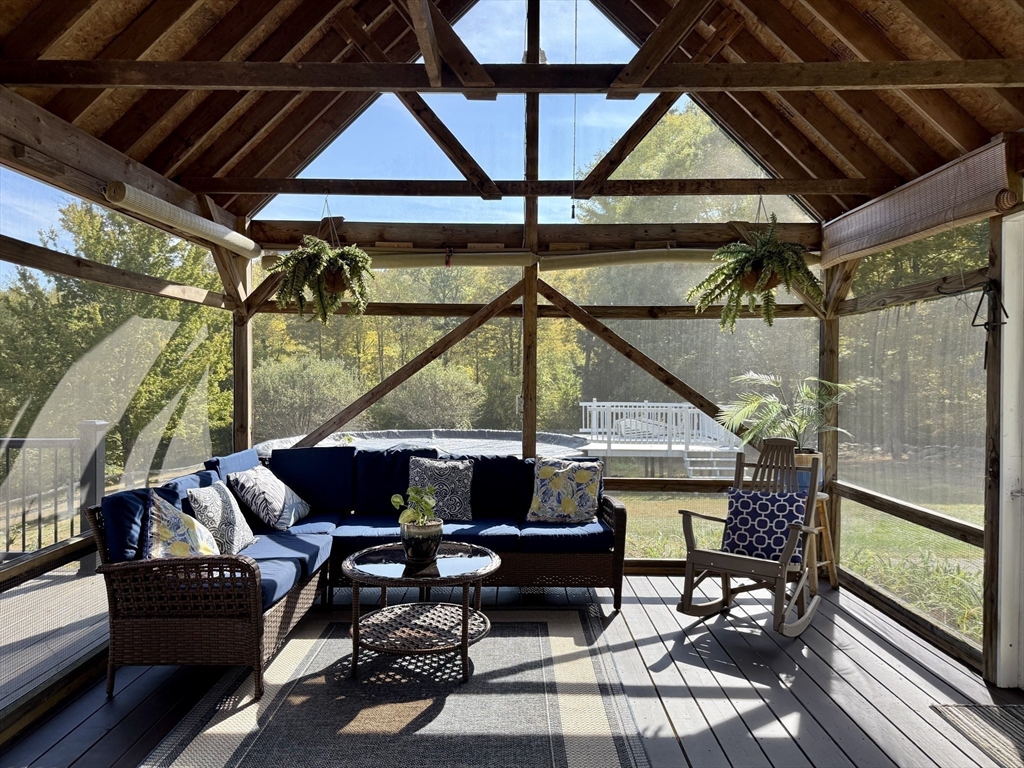 41 Hog Hollow Road Buckland, MA 01370 - Photo 31 of 42 a roof deck with a table and chairs