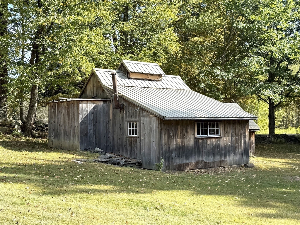 41 Hog Hollow Road Buckland, MA 01370 - Photo 39 of 42 a view of a house with backyard and tree