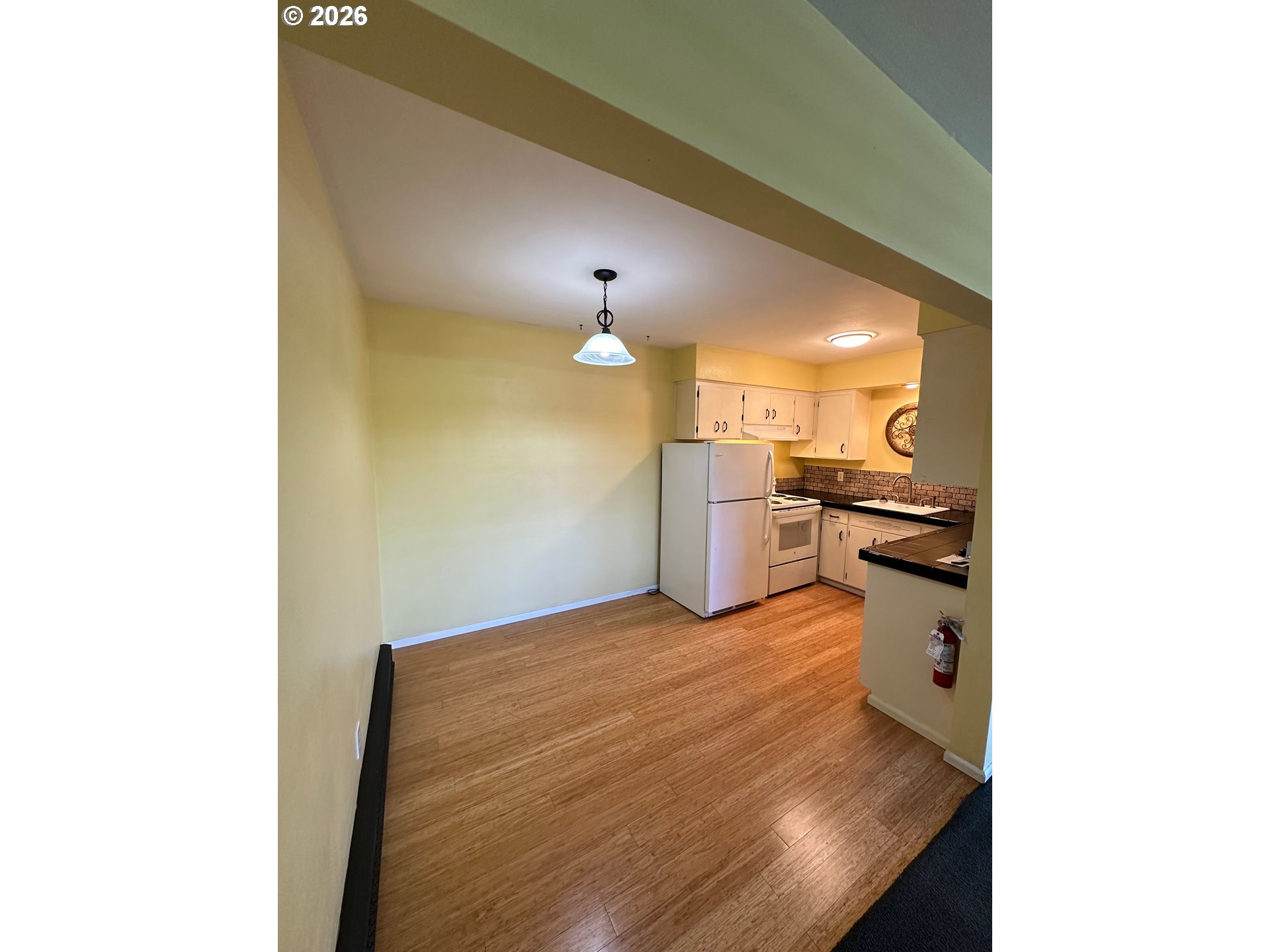 411 Southwest 5th Street Corvallis, OR 97333 - Photo 8 of 16 a view of a kitchen from a windows