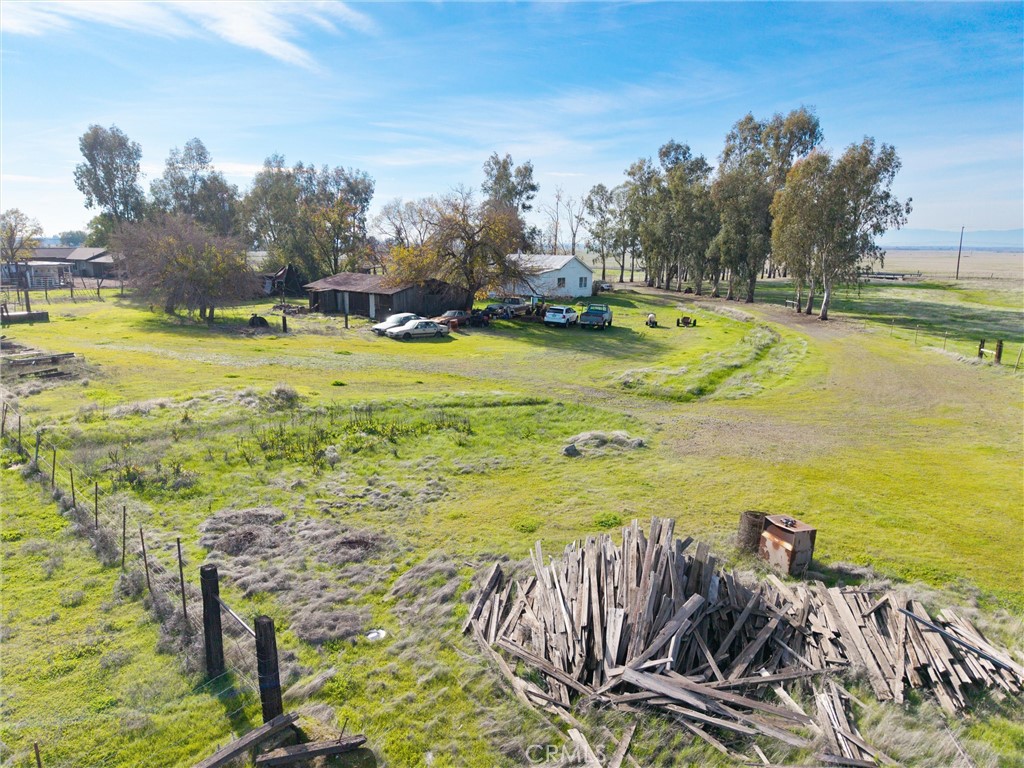 15696 Meridian Road Chico, CA 95973 - Photo 15 of 30 a view of a swimming pool with an outdoor seating and a garden