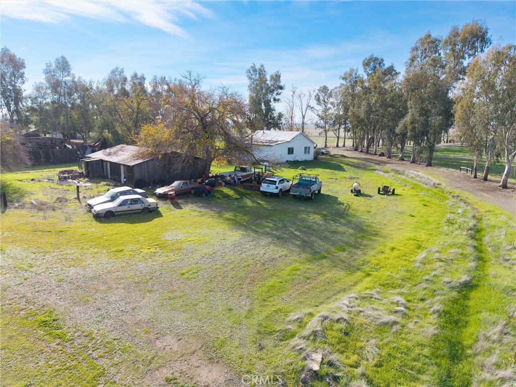 15696 Meridian Road Chico, CA 95973 - Photo 16 of 30 a view of a swimming pool with lawn chairs and plants