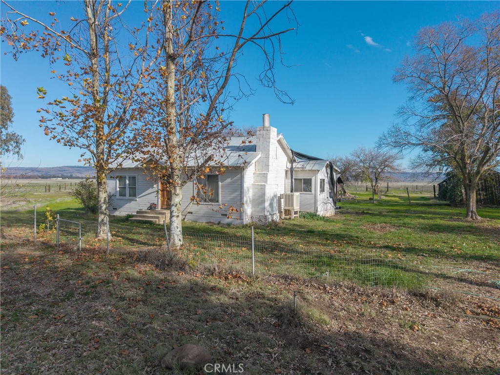 15696 Meridian Road Chico, CA 95973 - Photo 18 of 30 a view of a house with a yard