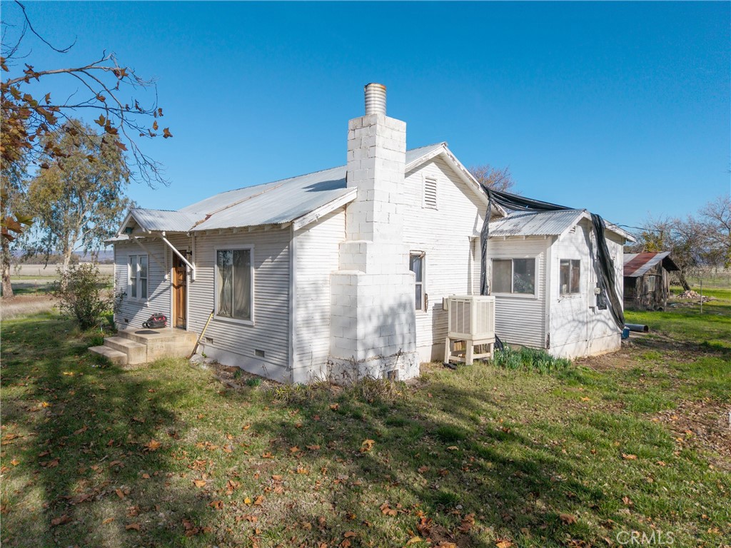 15696 Meridian Road Chico, CA 95973 - Photo 19 of 30 a front view of a house with a yard