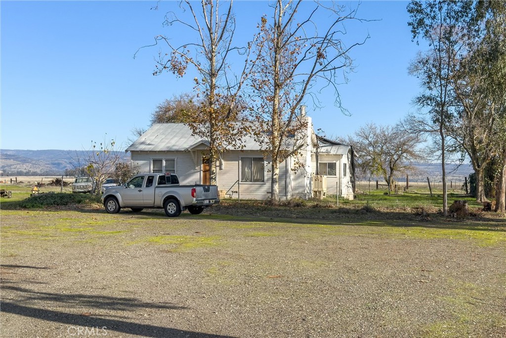 15696 Meridian Road Chico, CA 95973 - Photo 22 of 30 a view of a house with swimming pool and sitting area