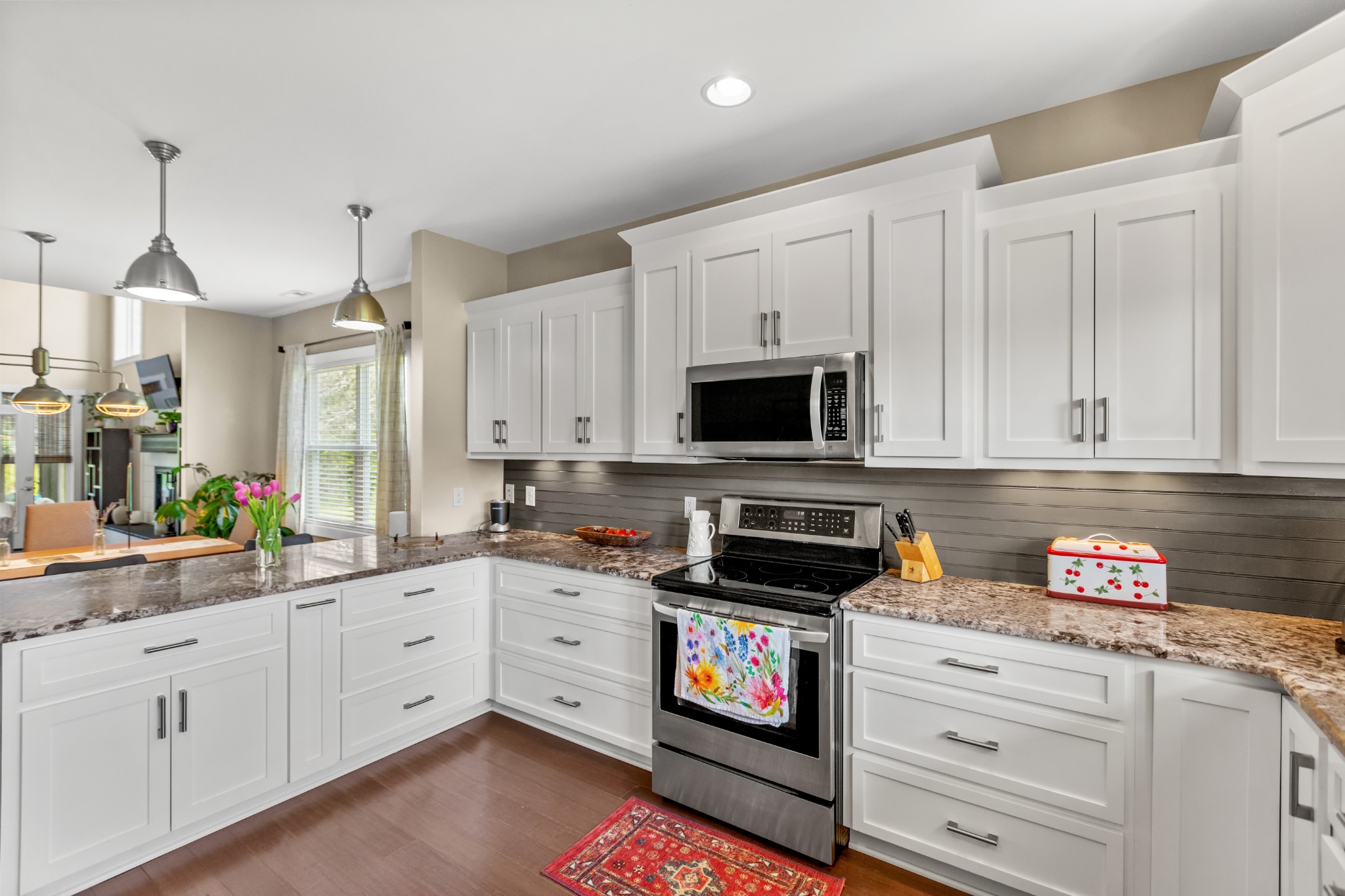 11484 Patterson Road Rockvale, TN 37153 - Photo 13 of 32 a kitchen with stainless steel appliances white cabinets sink and stove top oven