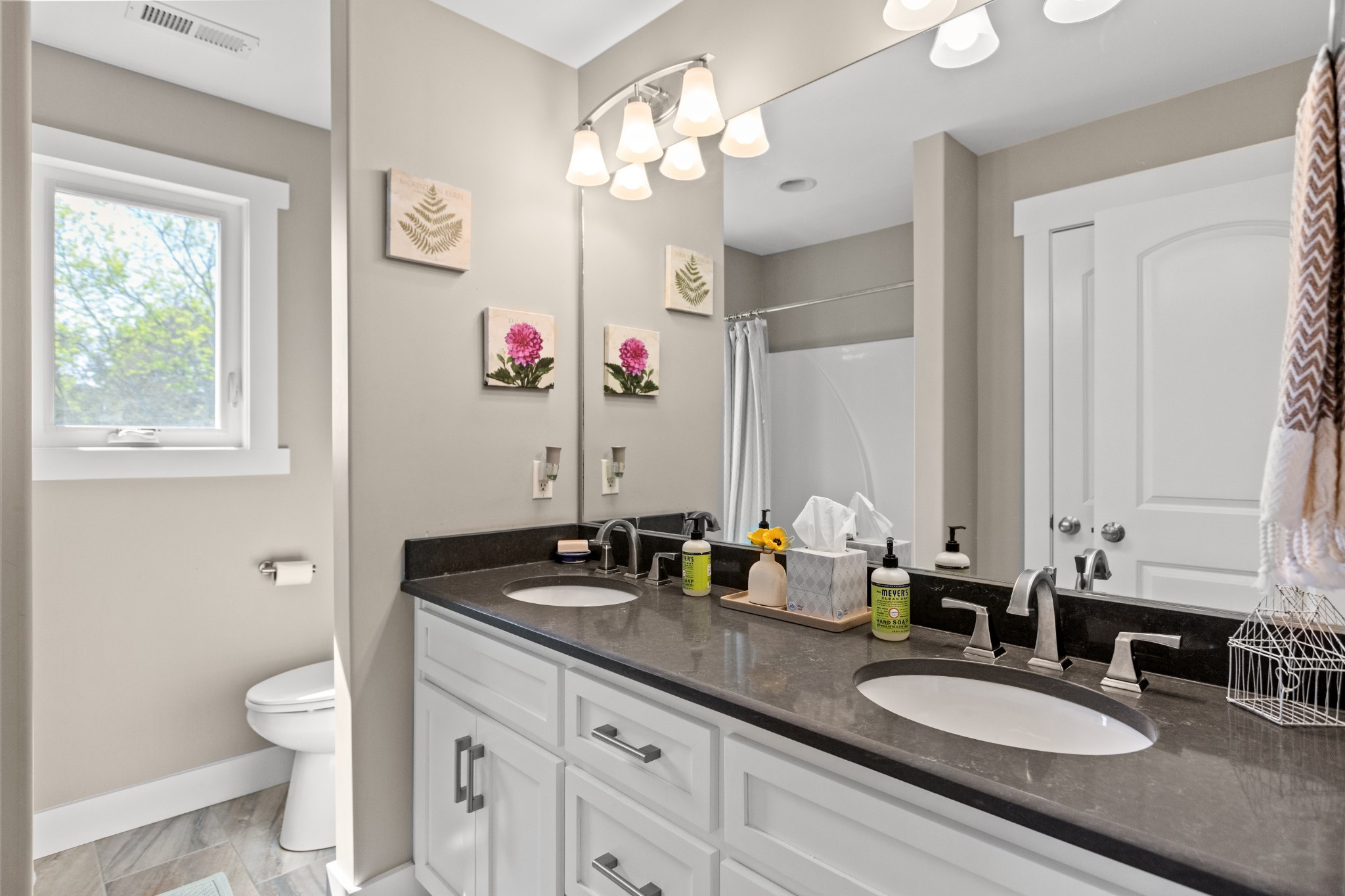 11484 Patterson Road Rockvale, TN 37153 - Photo 23 of 32 a bathroom with a granite countertop double vanity sink a mirror and a toilet