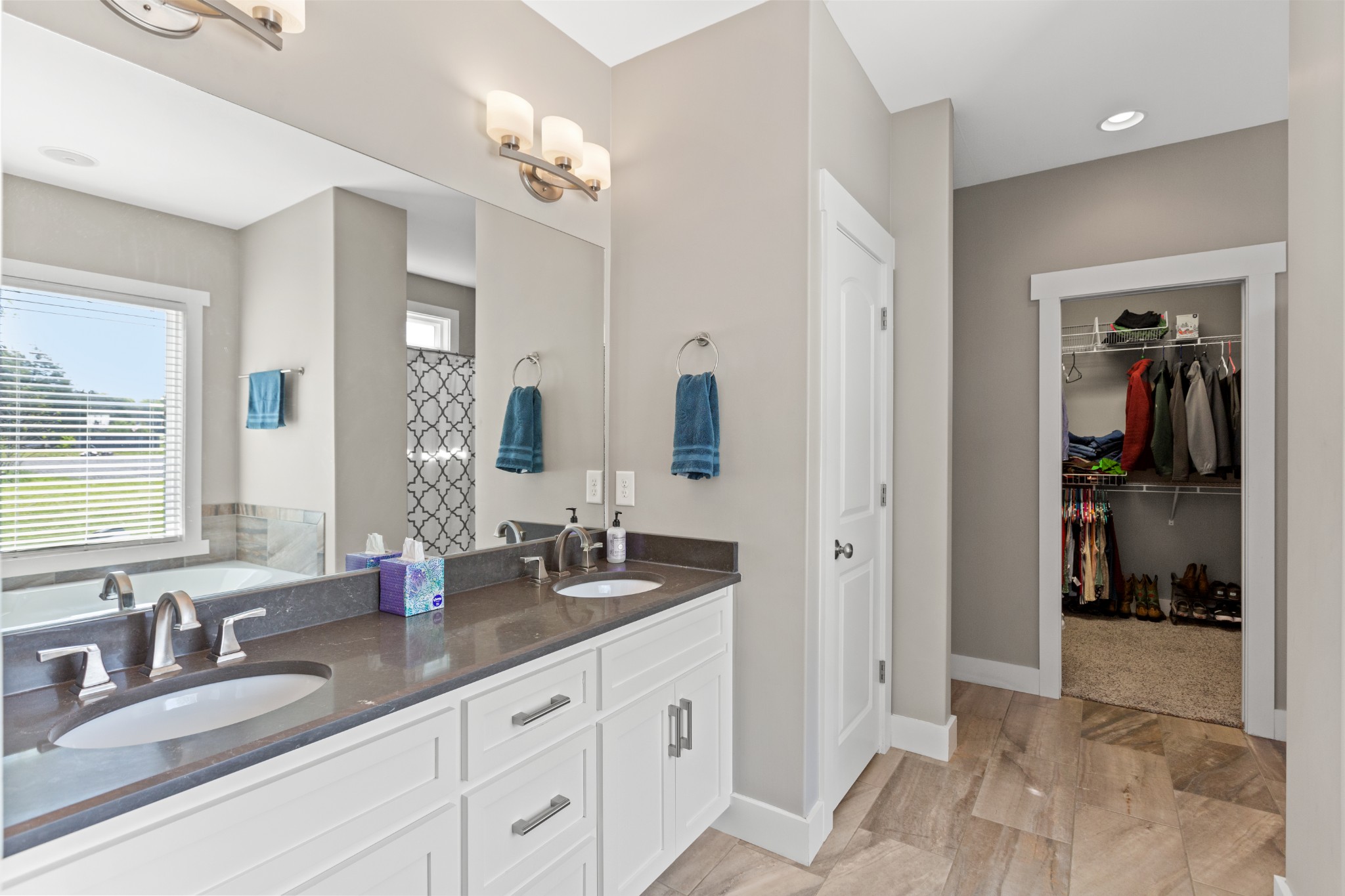 11484 Patterson Road Rockvale, TN 37153 - Photo 24 of 32 a spacious en suite bathroom with double sink and a mirror