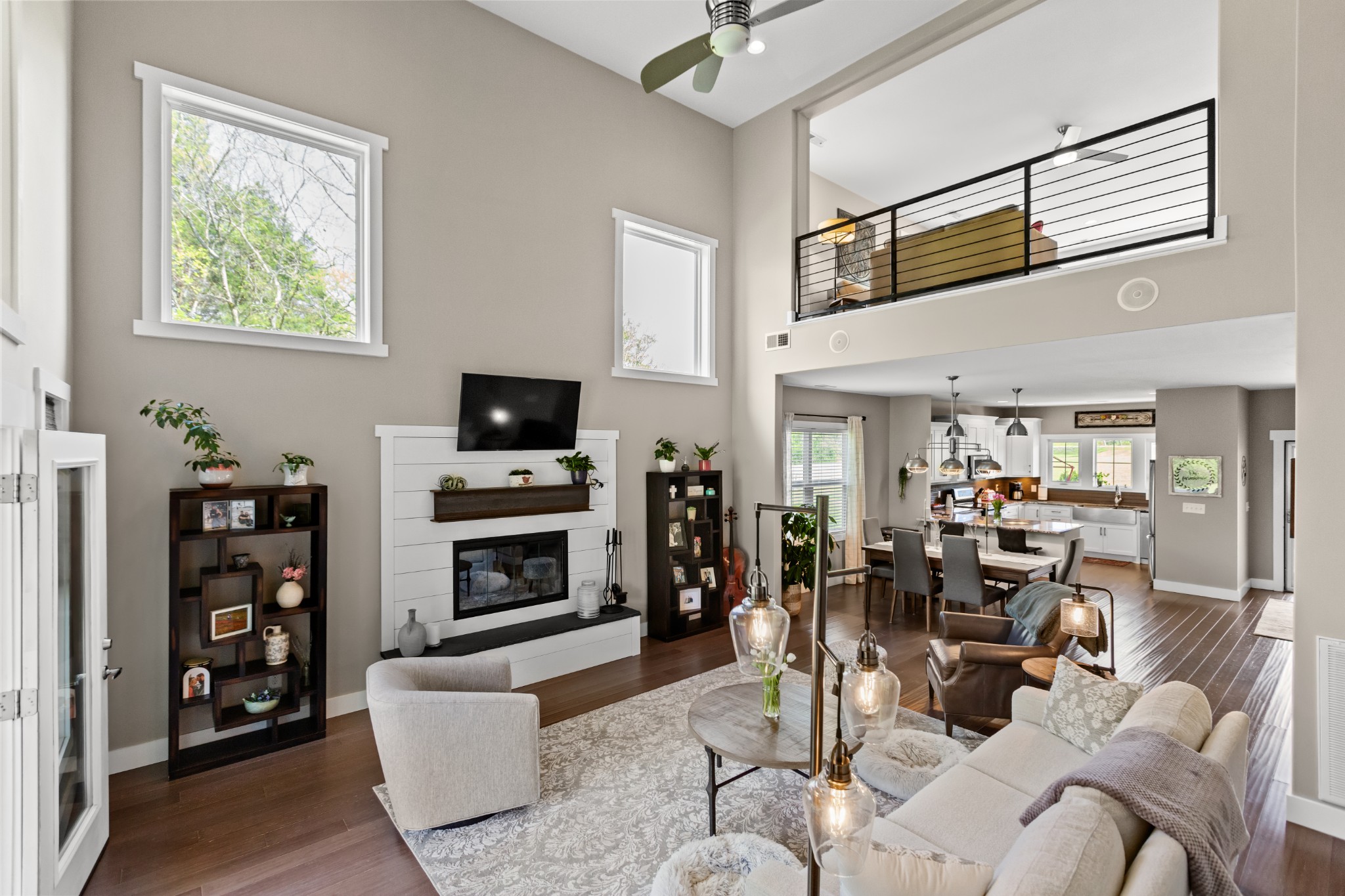 11484 Patterson Road Rockvale, TN 37153 - Photo 3 of 32 a living room with furniture a flat screen tv and a fireplace