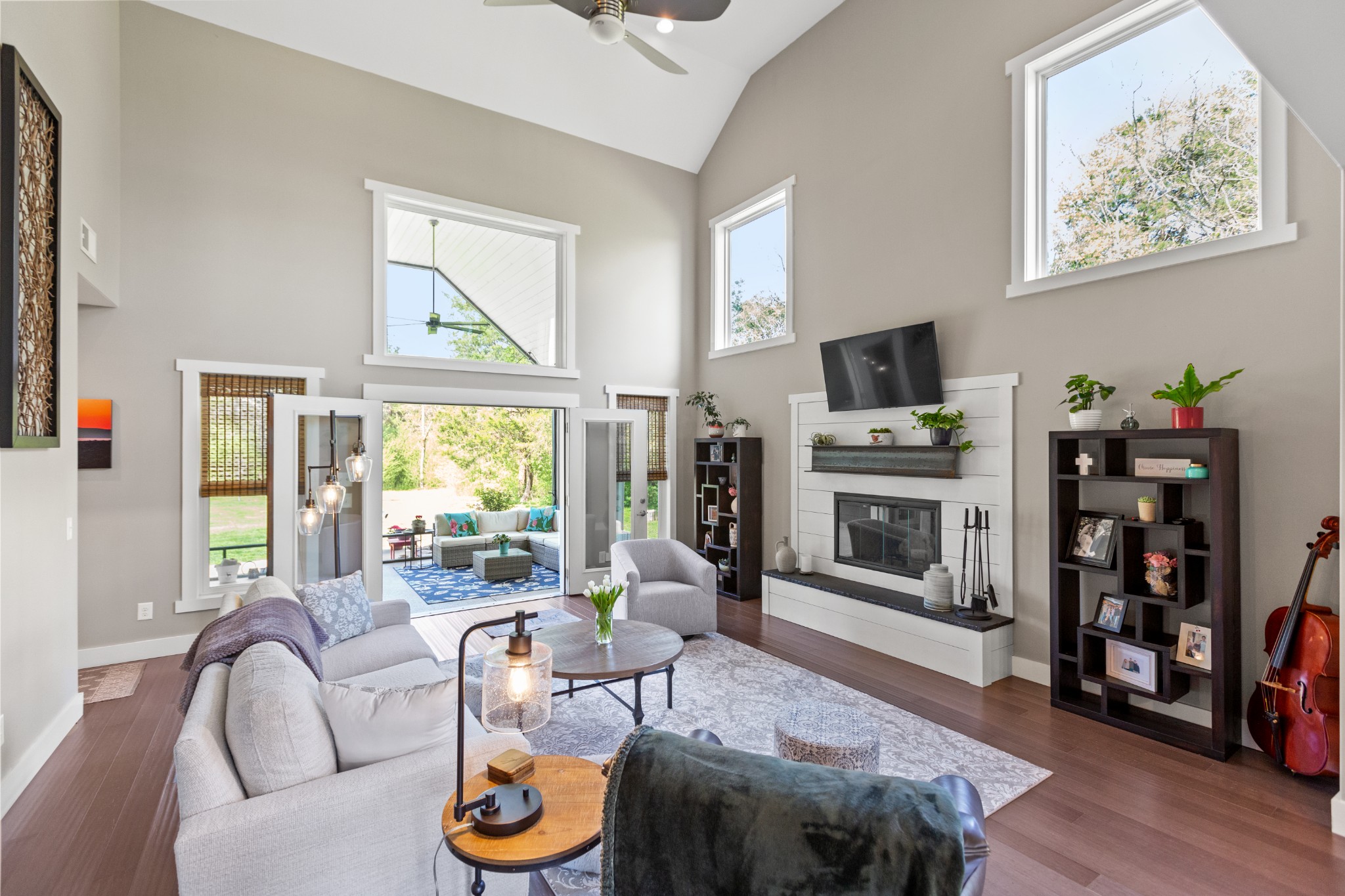 11484 Patterson Road Rockvale, TN 37153 - Photo 4 of 32 a living room with furniture a flat screen tv and a fireplace
