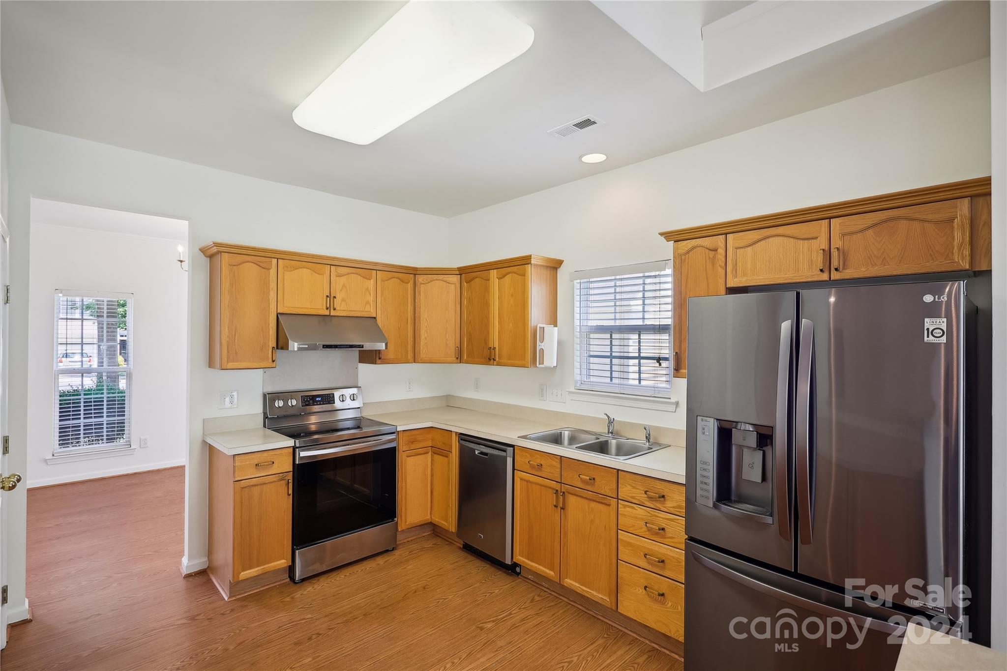 14336 Williams Glenn Road Charlotte, NC 28273 - Photo 12 of 39 a kitchen with stainless steel appliances granite countertop a refrigerator stove and sink