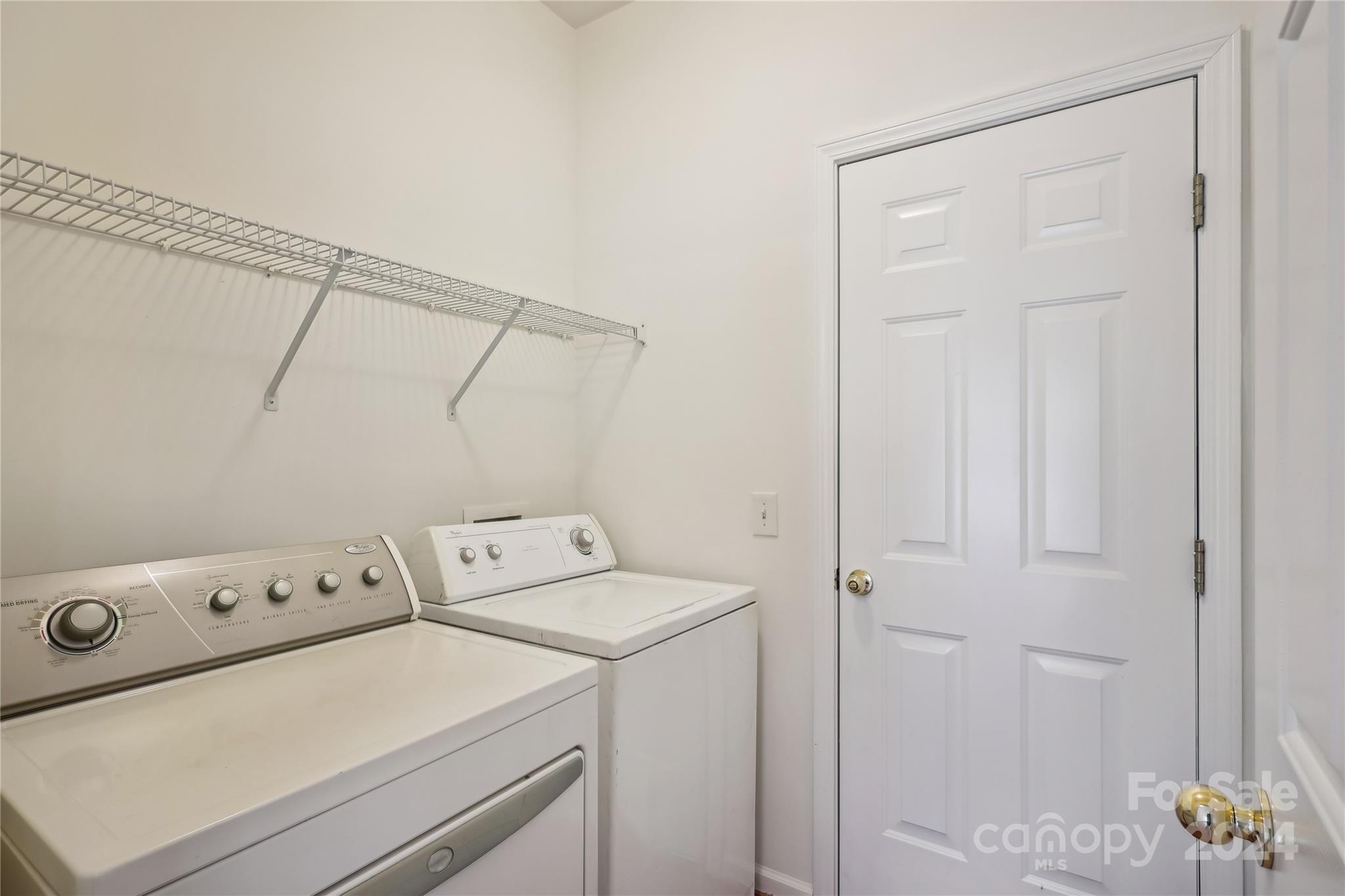 14336 Williams Glenn Road Charlotte, NC 28273 - Photo 17 of 39 a utility room with dryer and washer