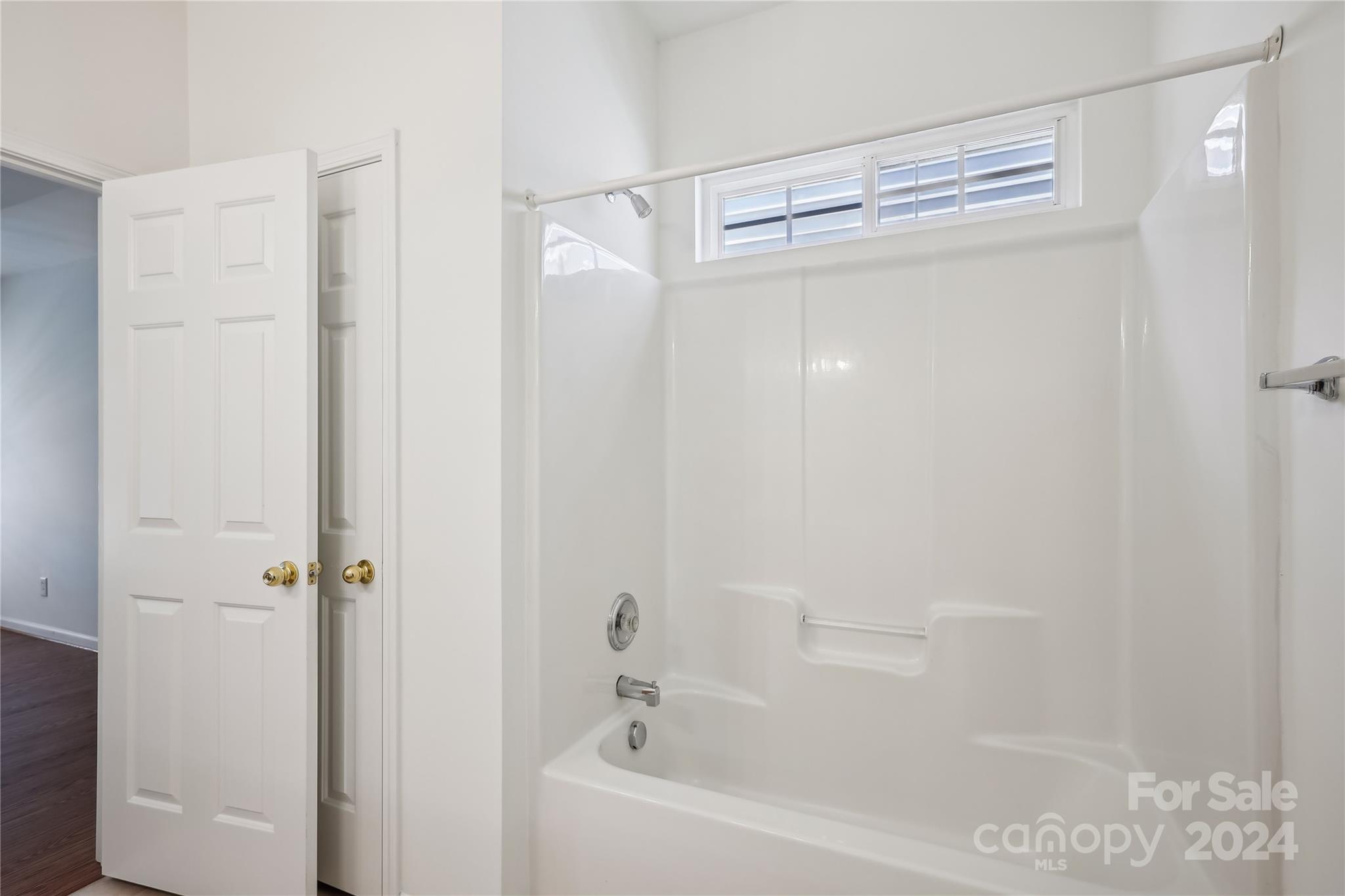 14336 Williams Glenn Road Charlotte, NC 28273 - Photo 20 of 39 a bathroom with a shower and a bath tub