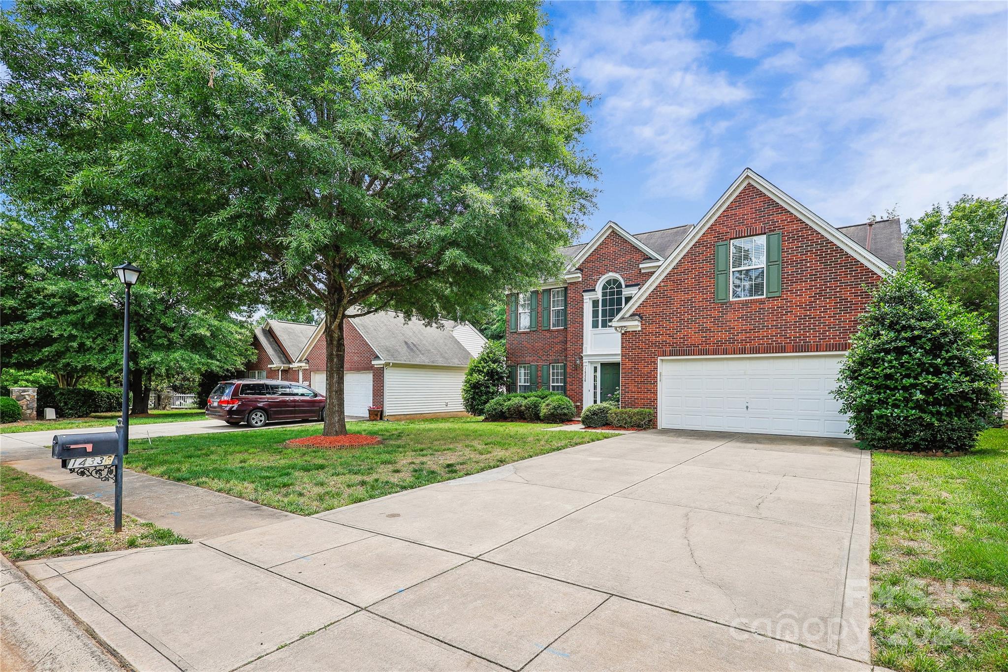 14336 Williams Glenn Road Charlotte, NC 28273 - Photo 2 of 39 a view of a house with a yard