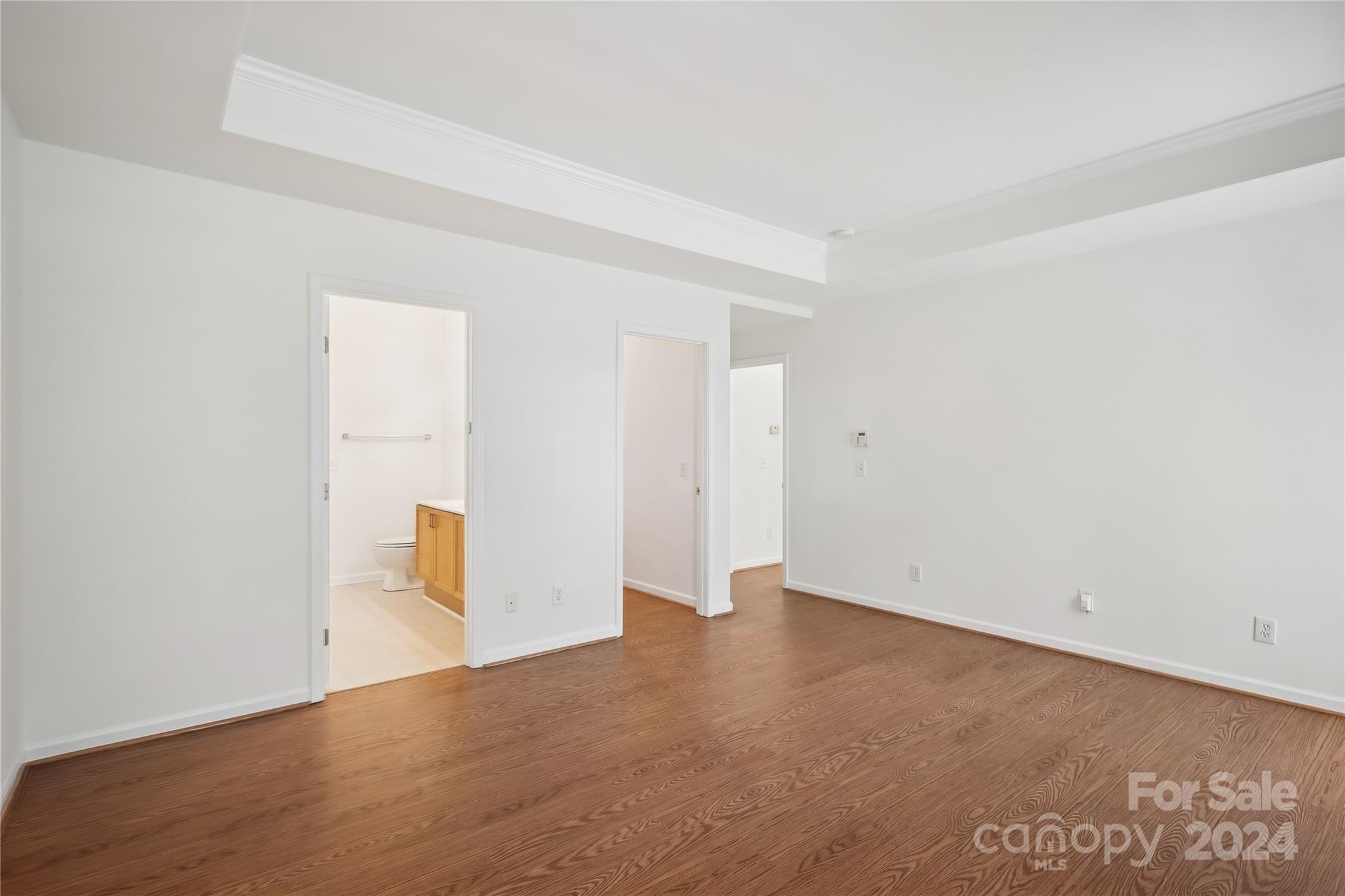 14336 Williams Glenn Road Charlotte, NC 28273 - Photo 23 of 39 an empty room with wooden floor