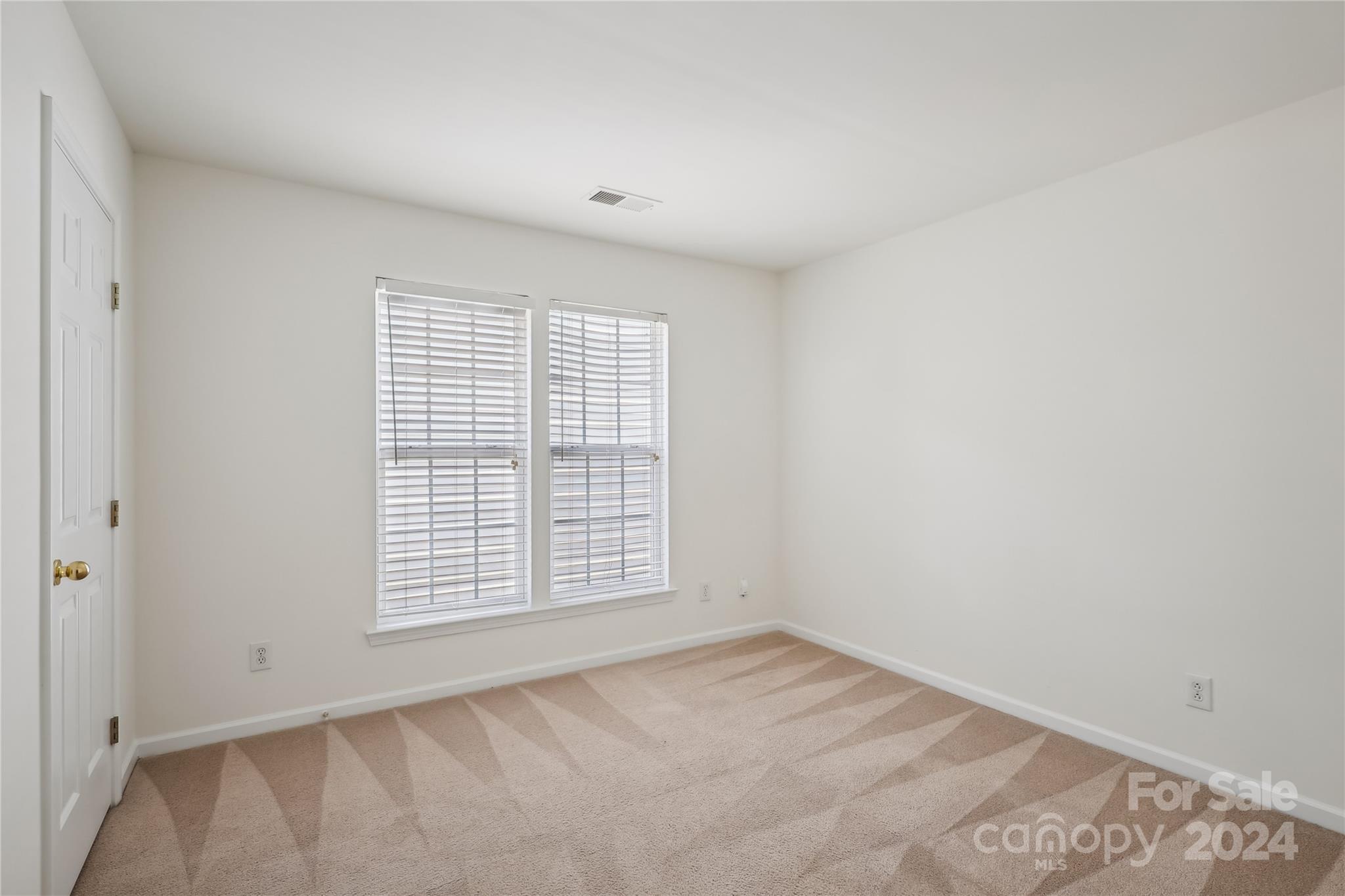 14336 Williams Glenn Road Charlotte, NC 28273 - Photo 27 of 39 an empty room with windows