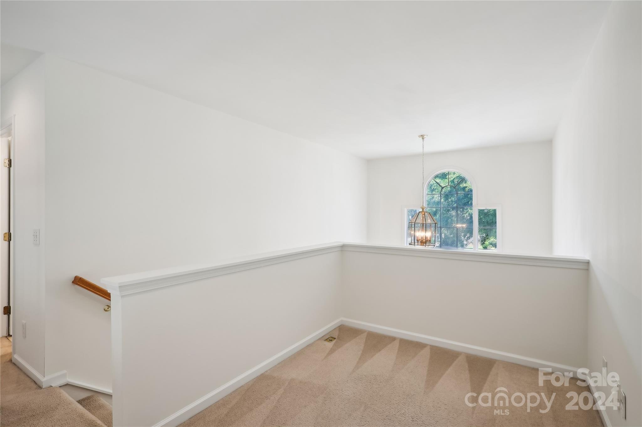 14336 Williams Glenn Road Charlotte, NC 28273 - Photo 31 of 39 a view of small space with racks on the wall