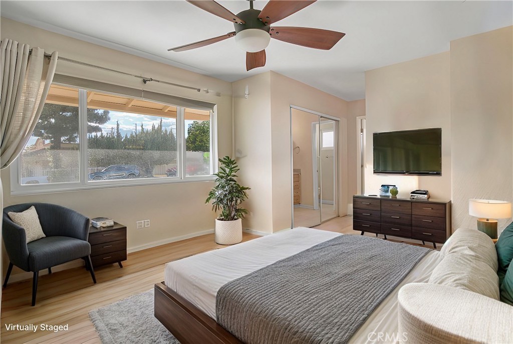 2390 Workman Avenue Simi Valley, CA 93063 - Photo 12 of 21 a bedroom with a bed and a flat screen tv