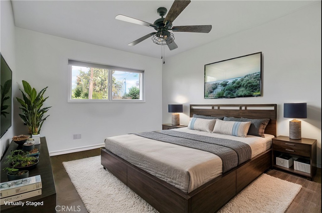 2390 Workman Avenue Simi Valley, CA 93063 - Photo 15 of 21 a bedroom with bed and a potted plant