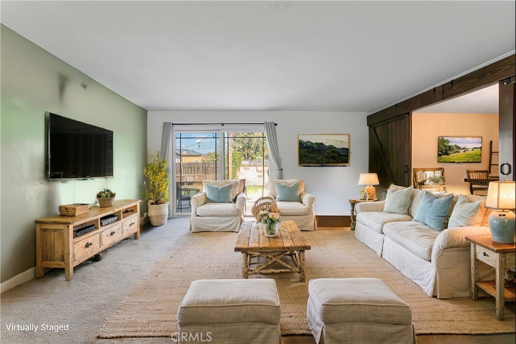 2390 Workman Avenue Simi Valley, CA 93063 - Photo 4 of 21 a living room with furniture and a flat screen tv