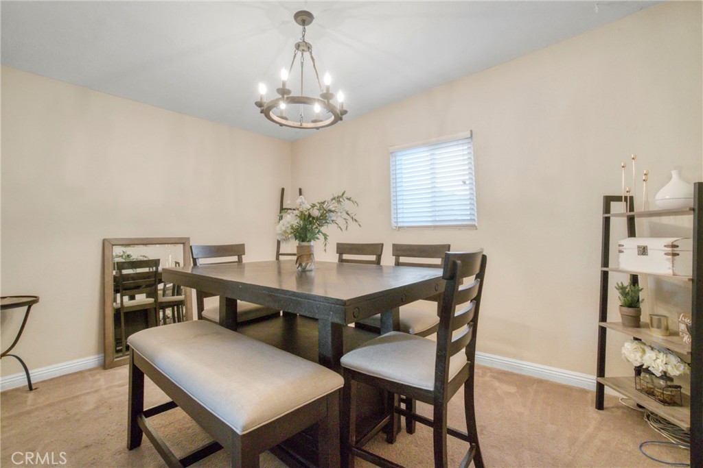 2390 Workman Avenue Simi Valley, CA 93063 - Photo 7 of 21 a view of a dining room with furniture and chandelier