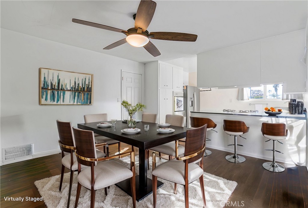 2390 Workman Avenue Simi Valley, CA 93063 - Photo 9 of 21 a view of a dining room with furniture and wooden floor