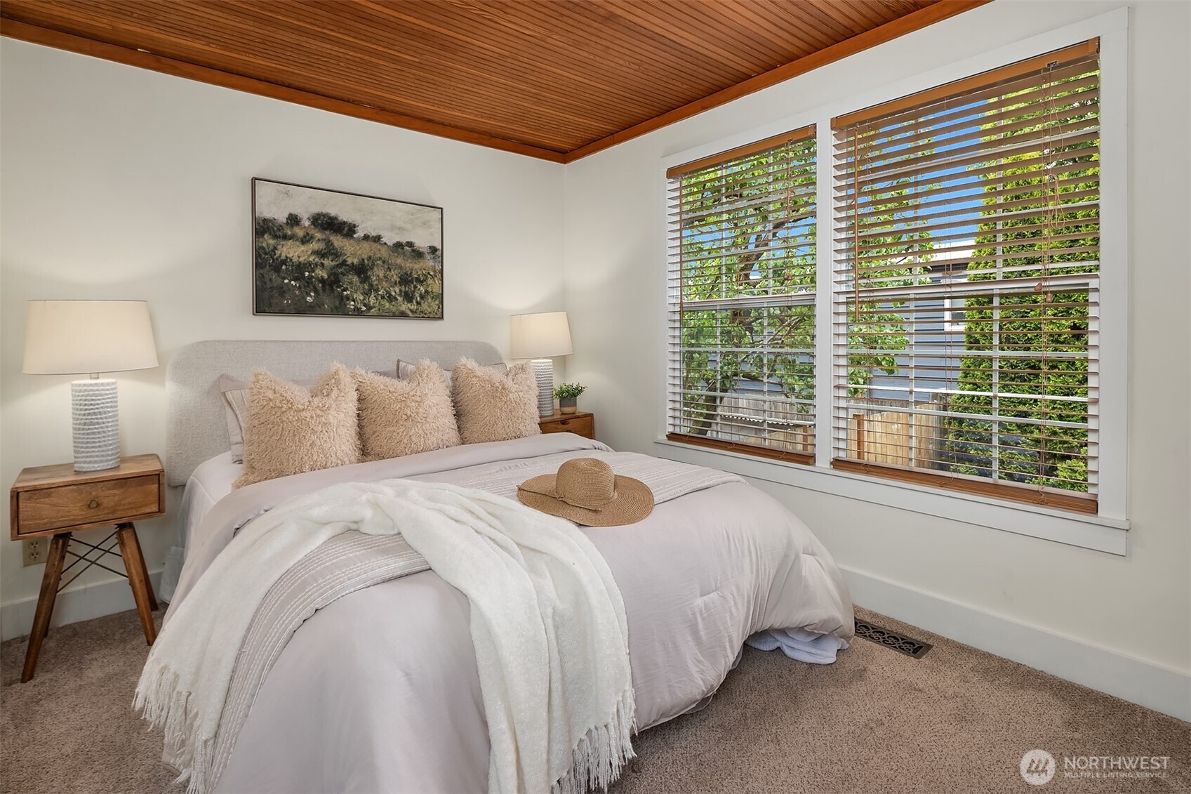5519 18th Avenue South Seattle, WA 98108 - Photo 16 of 32 a bedroom with a bed and a large window