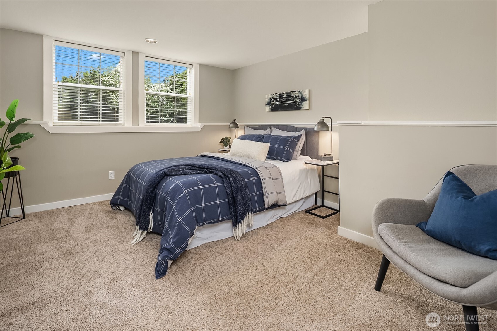 5519 18th Avenue South Seattle, WA 98108 - Photo 24 of 32 a bed room with a bed and a chair