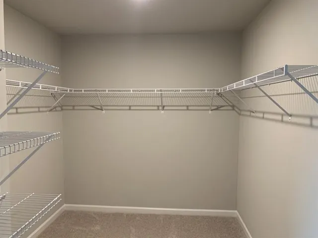 a view of a room with racks on the wall